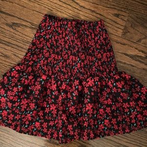 Floral girls skirt size 10 with elastic waist.